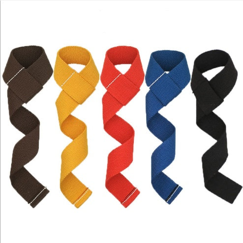 Hand gripping a dumbbell using PhantomGrip Lifting Straps for secure lifting support.